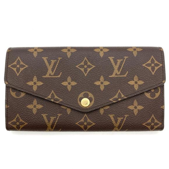 LOUIS VUITTON Brown Monogram Wallet - Picture 1 of 11